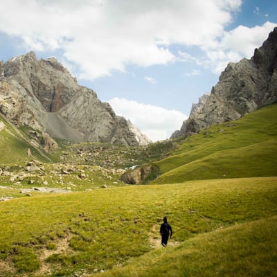 Trekkers on a mountain trail in Kyrgyzstan